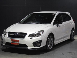 Fourth-generation Subaru Impreza hatchback.